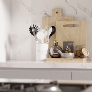 Modern kitchen countertop with utensils and decor, showcasing minimalist style.